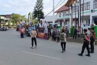 Anggota Polres Aceh Barat mengerahkan sejumlah personel untuk mengawali dan mengamankan Kegiatan Pengamanan Aksi Damai Bela Palestina. Foto tbnews